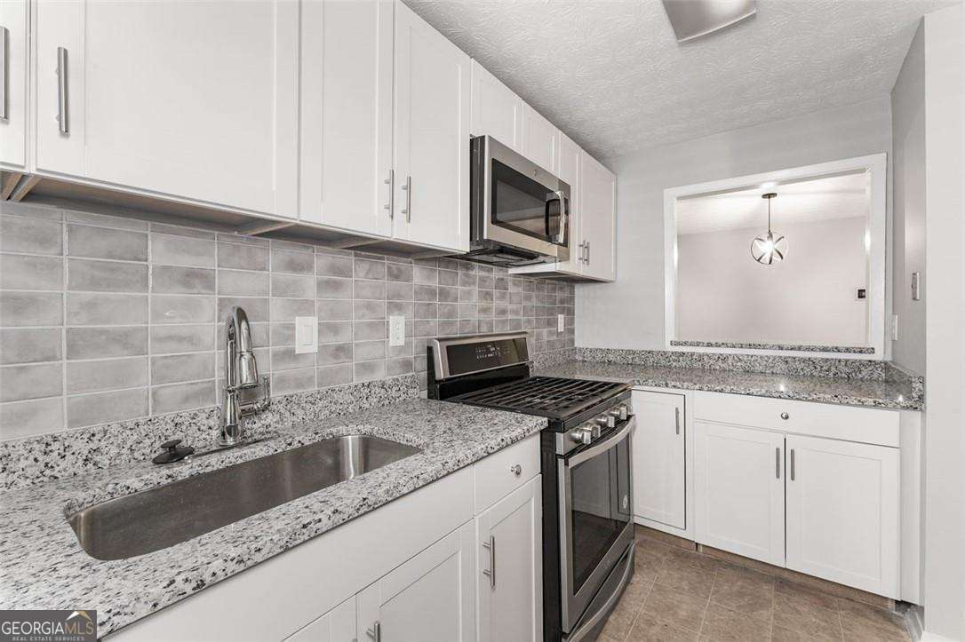 2 bedroom, 1 bathroom, 1,072 sq ft condominium for sale at 308 CUMBERLAND Court, Smyrna, GA 30080 — photo 4
