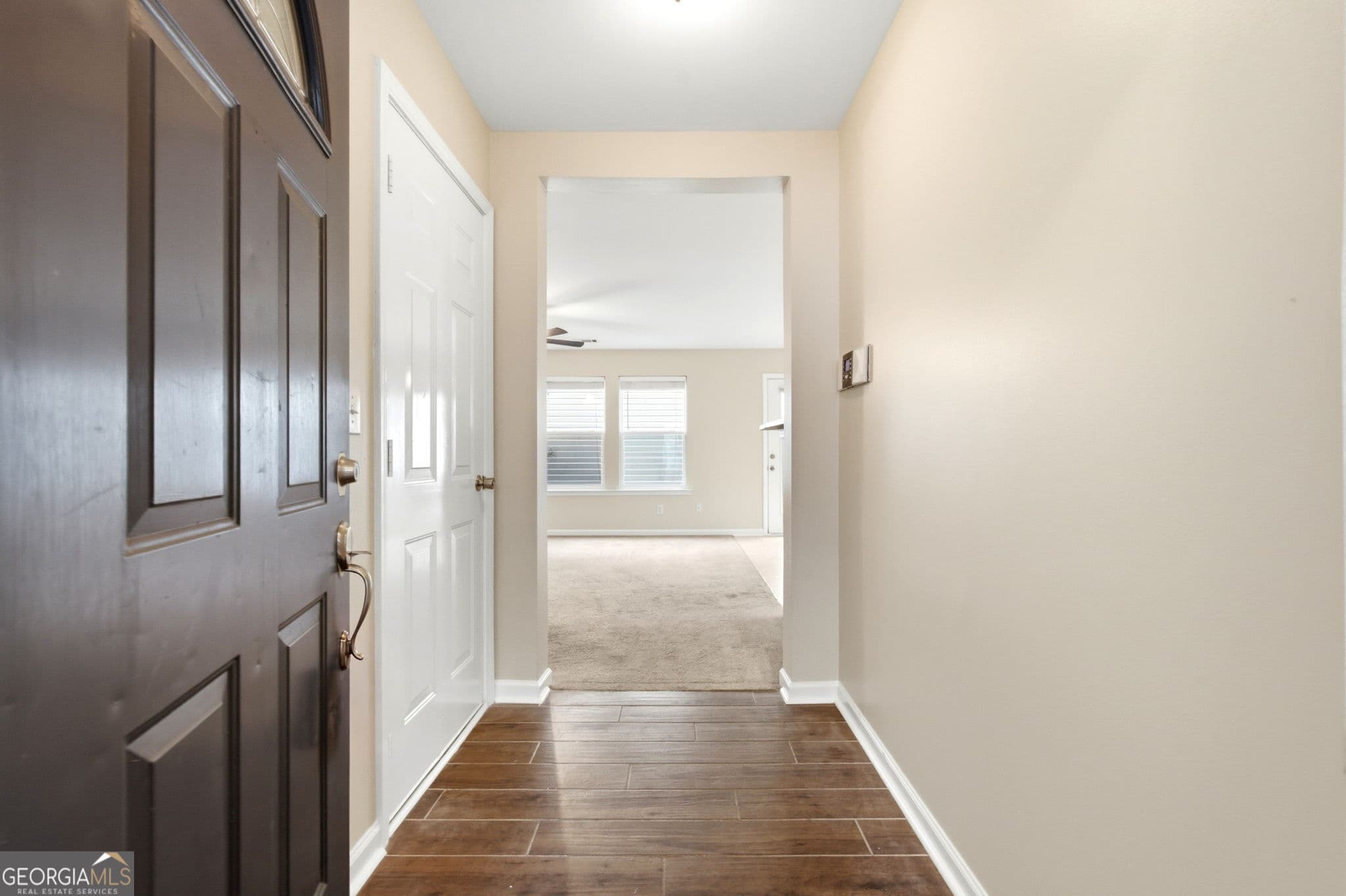 4 bedroom, 2.5 bathroom, 1,725 sq ft single family residence for sale at 3617 Roseman Landing, Cumming, GA 30040 — photo 3