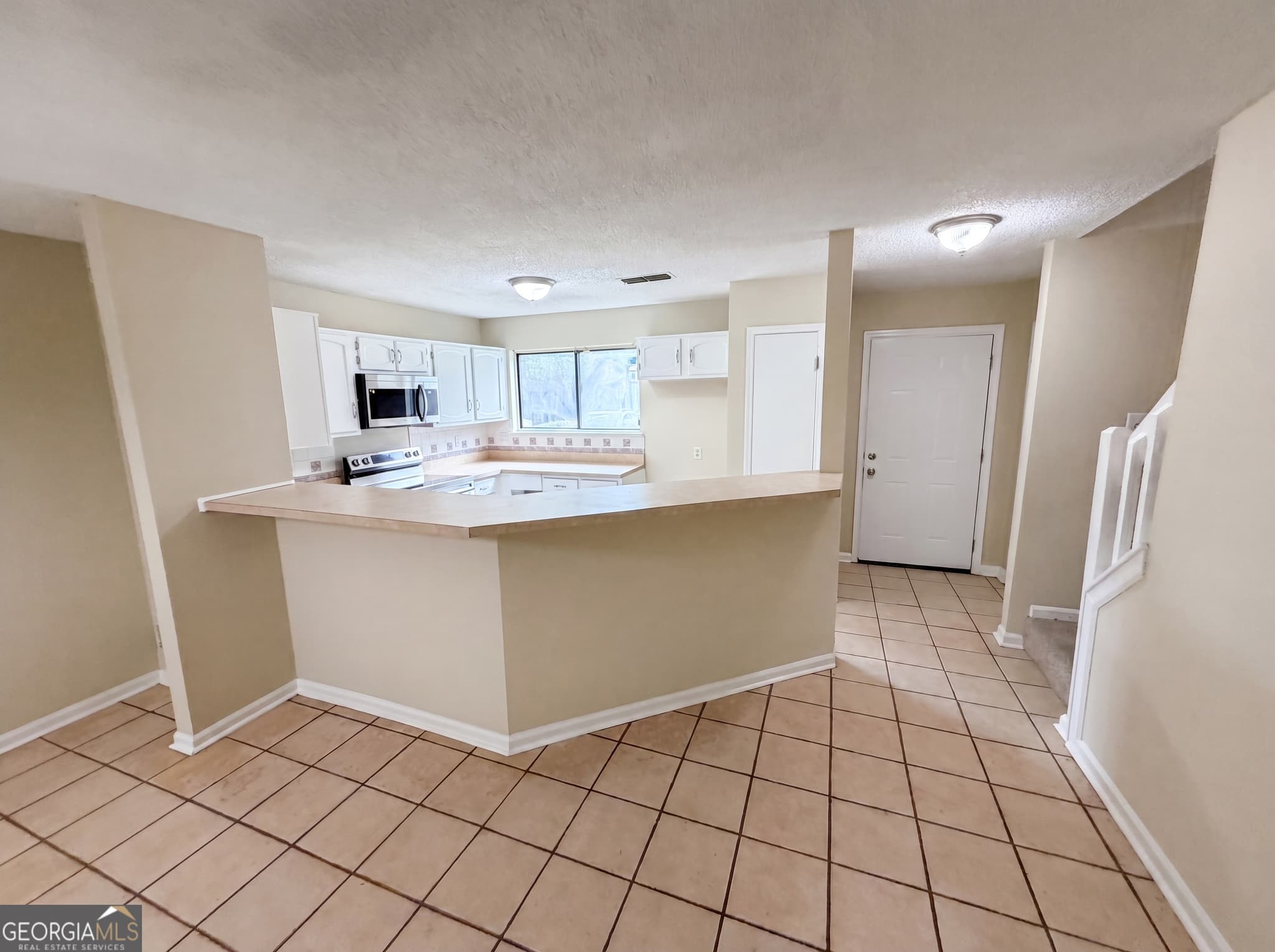 2 bedroom, 2.5 bathroom, 1,364 sq ft townhouse for sale at 3271 Tennington Place 0, Lawrenceville, GA 30044 — photo 7