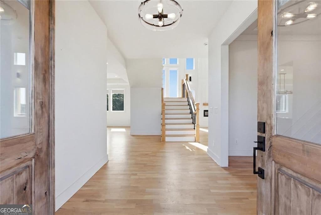 4 bedroom, 4 bathroom, 2,878 sq ft single family residence for sale at 5746 Avalon Commons Way, Clermont, GA 30527 — photo 7