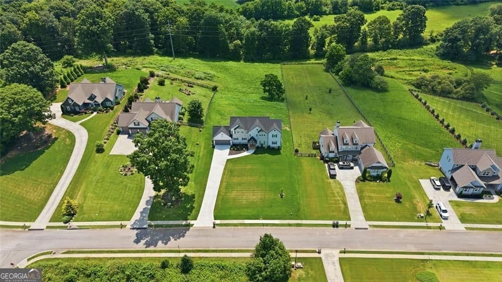 4 bedroom, 4 bathroom, 2,878 sq ft single family residence for sale at 5746 Avalon Commons Way, Clermont, GA 30527 — photo 5