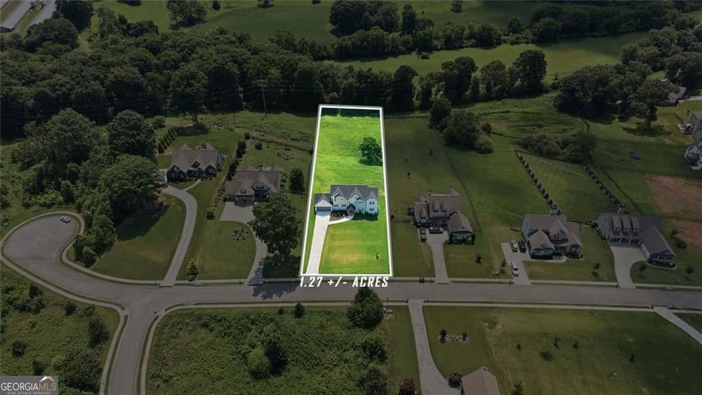 4 bedroom, 4 bathroom, 2,878 sq ft single family residence for sale at 5746 Avalon Commons Way, Clermont, GA 30527 — photo 4