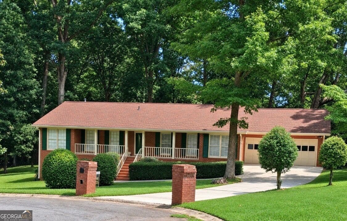 4 bedroom, 3.5 bathroom, 4,456 sq ft single family residence for sale at 2589 King Circle, Conyers, GA 30013 — photo 1 of 27