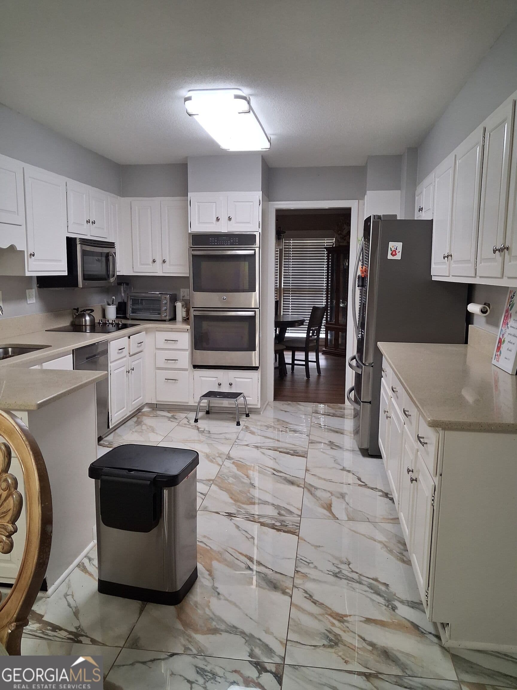 4 bedroom, 3.5 bathroom, 4,456 sq ft single family residence for sale at 2589 King Circle, Conyers, GA 30013 — photo 8
