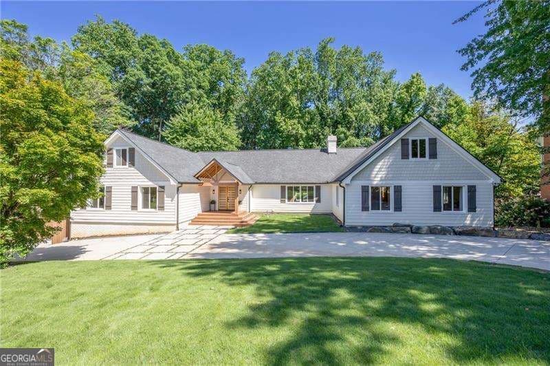 4 bedroom, 3.5 bathroom, 5,370 sq ft single family residence sold at 155 Marsh Glen Point, Sandy Springs, GA 30328