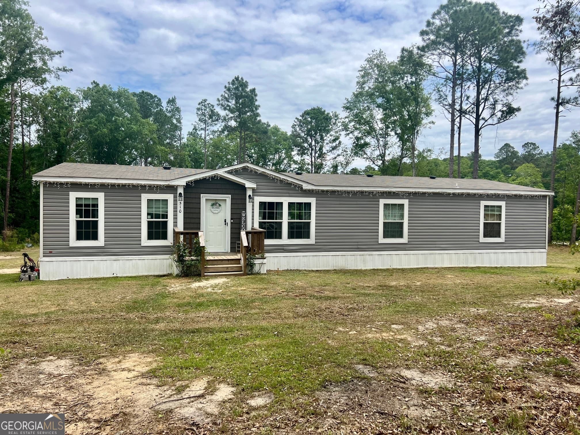 4 bedroom, 2 bathroom, 2,017 sq ft manufactured home,mobile home sold at 310 Magnolia Bluff Drive, Metter, GA 30439