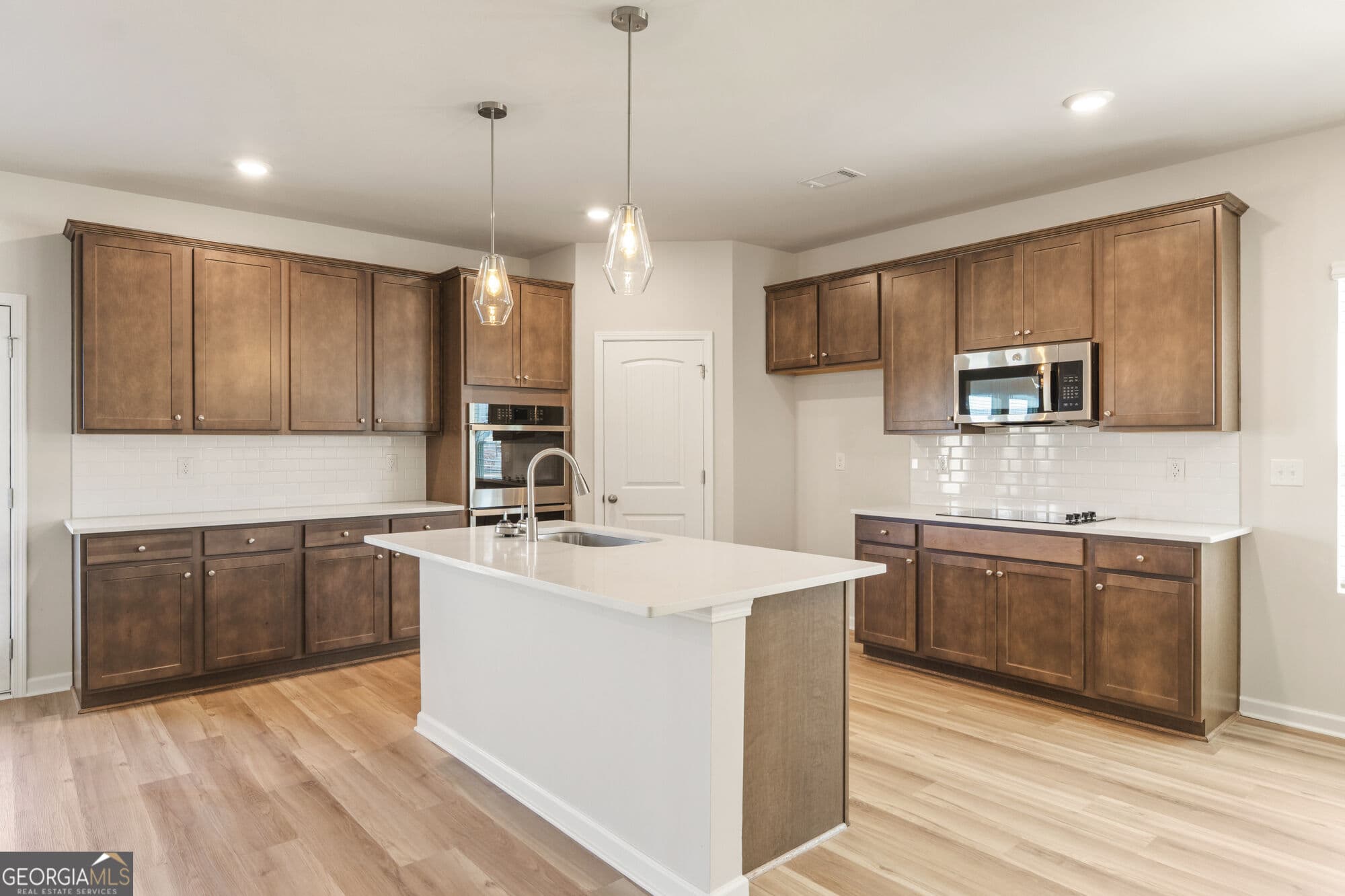 5 bedroom, 3.5 bathroom, 2,100 sq ft single family residence for sale at 1173 Homer Way, Greensboro, GA 30642 — photo 6