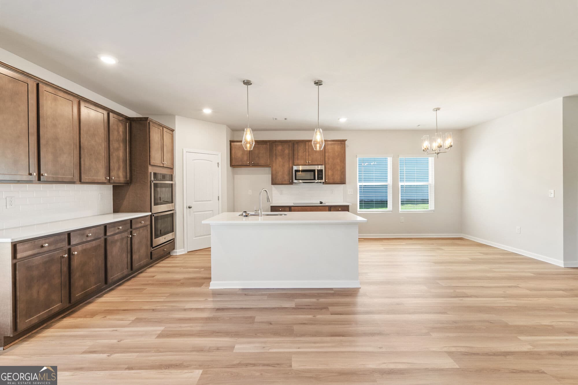 5 bedroom, 3.5 bathroom, 2,100 sq ft single family residence for sale at 1173 Homer Way, Greensboro, GA 30642 — photo 7
