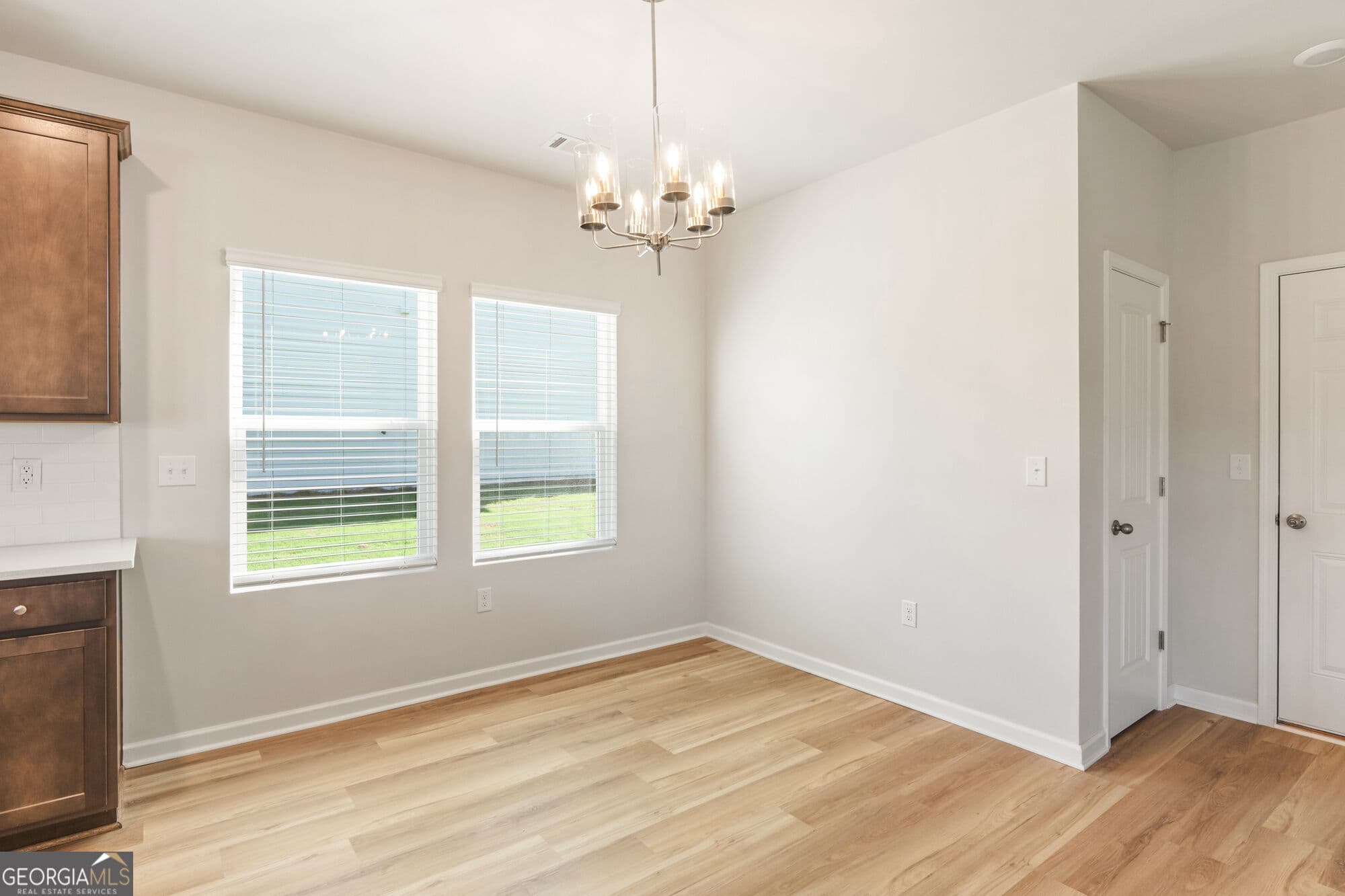 5 bedroom, 3.5 bathroom, 2,100 sq ft single family residence for sale at 1173 Homer Way, Greensboro, GA 30642 — photo 3