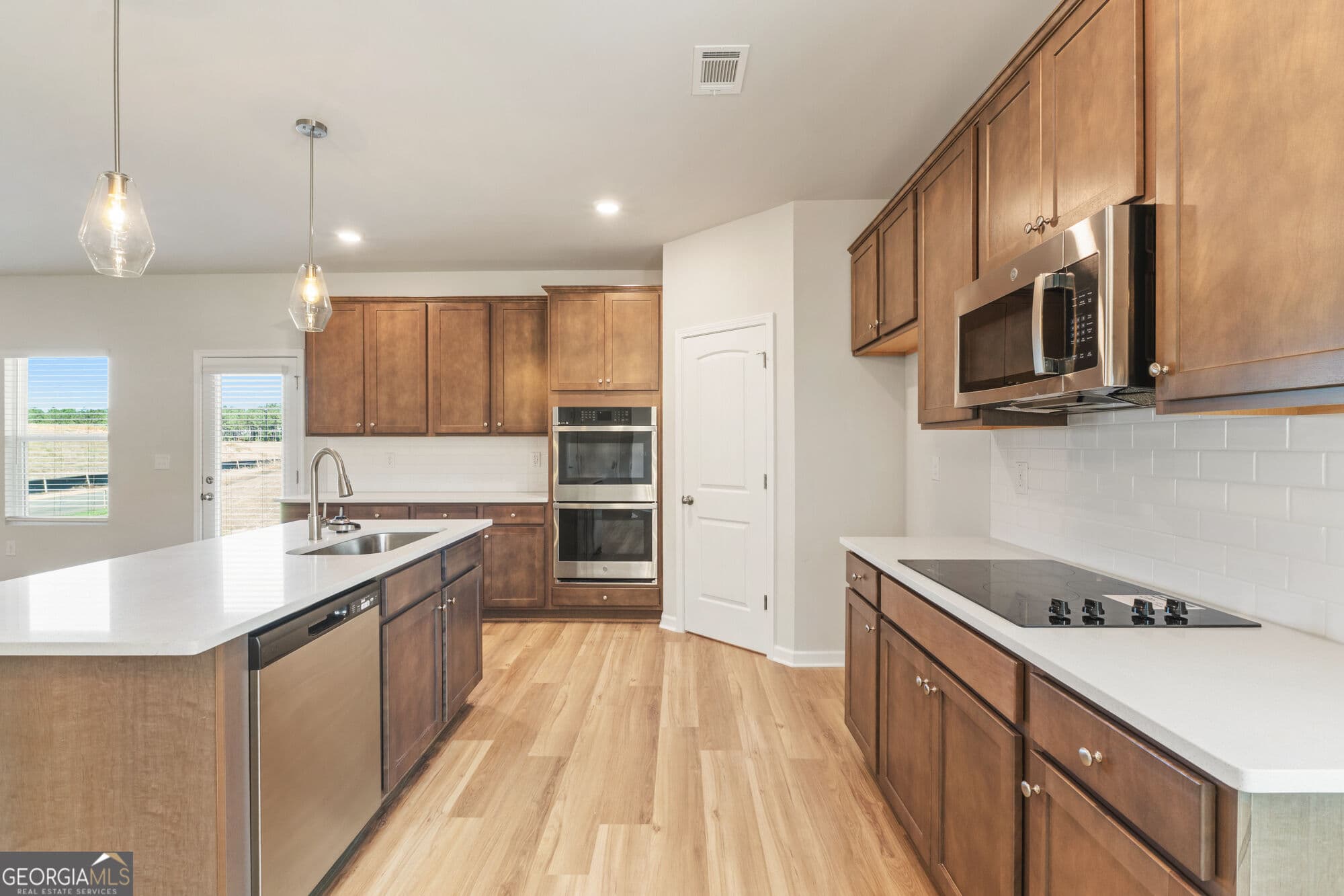 5 bedroom, 3.5 bathroom, 2,100 sq ft single family residence for sale at 1173 Homer Way, Greensboro, GA 30642 — photo 5
