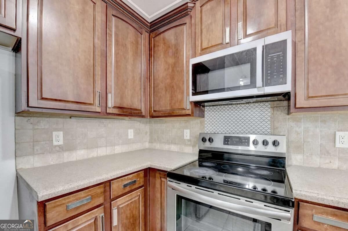 3 bedroom, 2.5 bathroom, 1,548 sq ft condominium for sale at 5510 Stonewood Court, Norcross, GA 30093 — photo 8