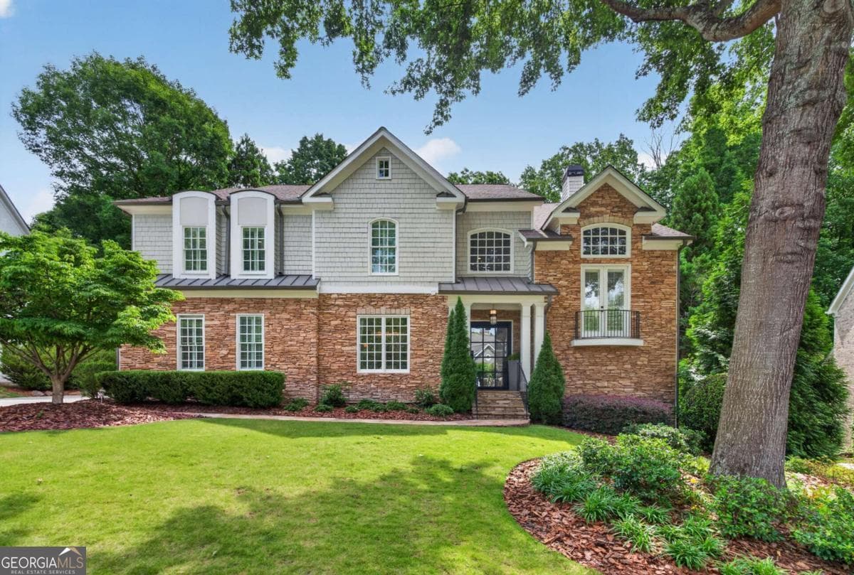 5 bedroom, 4.5 bathroom, 5,329 sq ft single family residence sold at 800 Lake Summit Drive, Atlanta, GA 30342