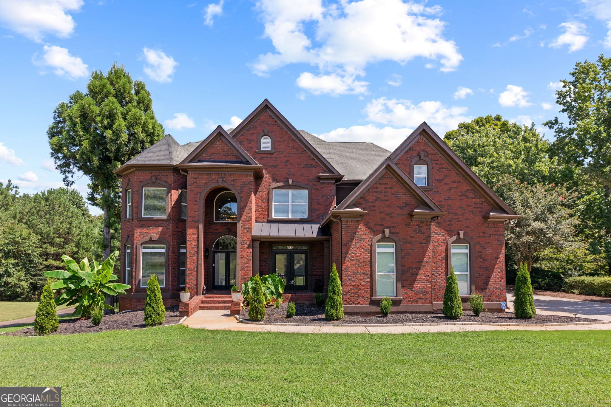 6 bedroom, 5 bathroom, 5,601 sq ft single family residence sold at 6048 Golf View Crossing, Locust Grove, GA 30248