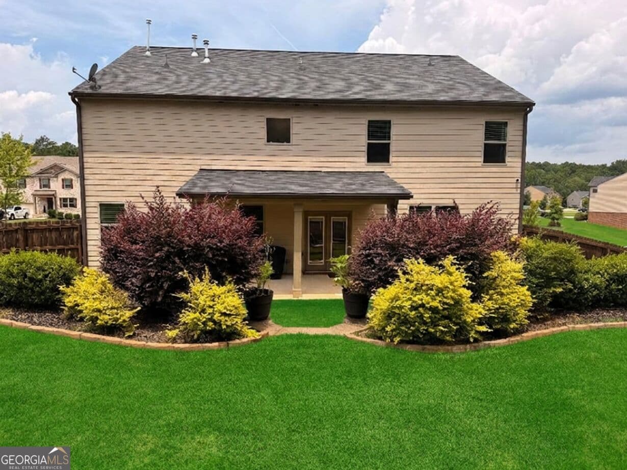 5 bedroom, 4.5 bathroom, 3,564 sq ft single family residence for sale at 734 Basswood Avenue, Mcdonough, GA 30252 — photo 2