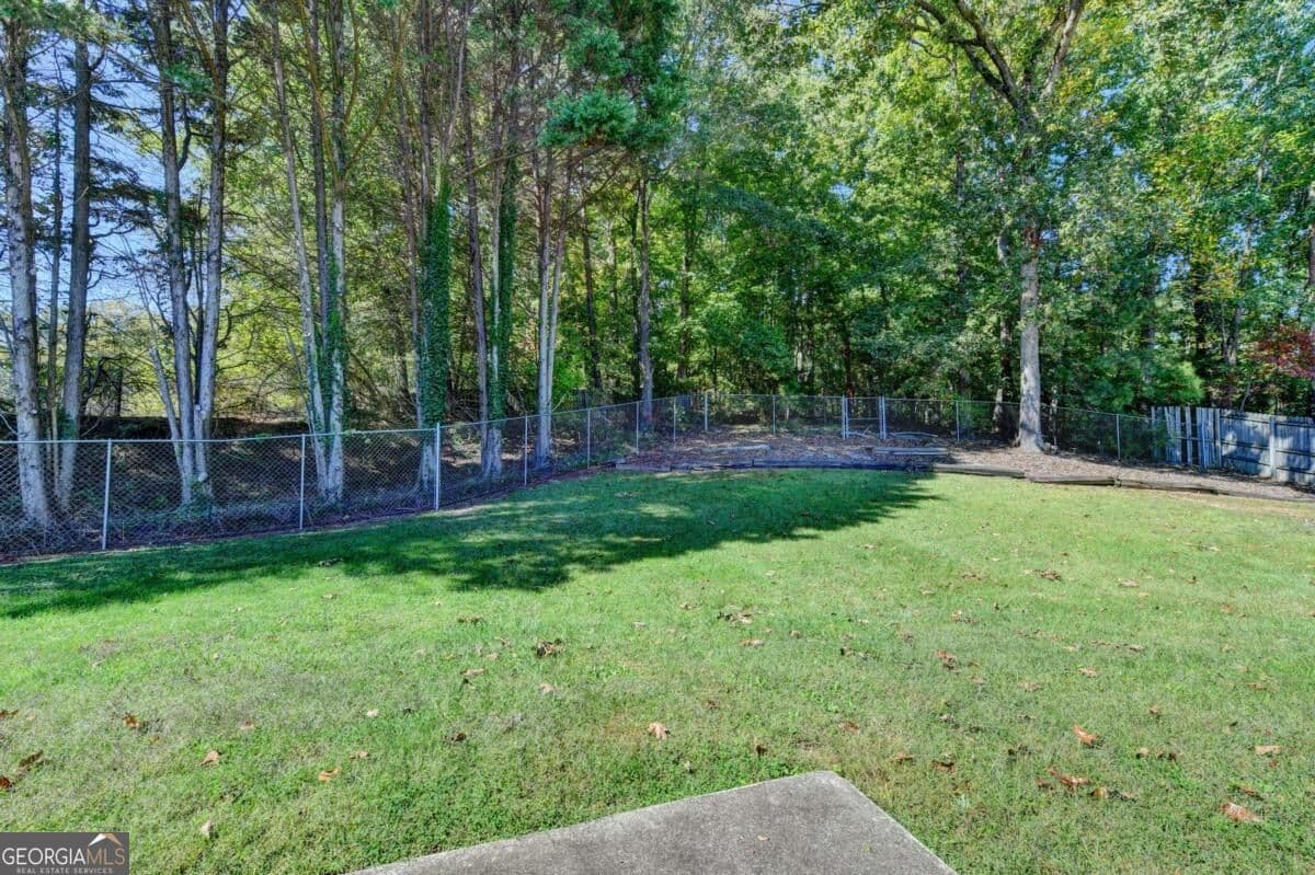 3 bedroom, 2 bathroom, 1,404 sq ft single family residence for sale at 5295 Hillcrest Glenn Drive, Sugar Hill, GA 30518 — photo 5