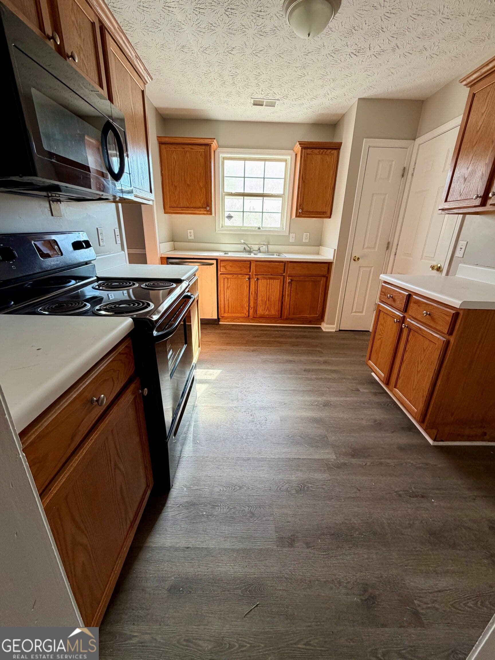 4 bedroom, 2.5 bathroom single family residence for sale at 9154 Claude Court, Jonesboro, GA 30238 — photo 7