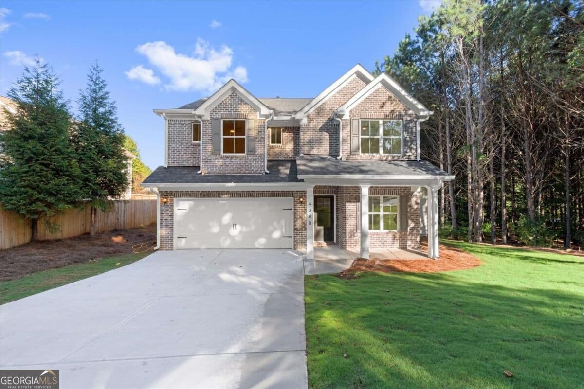 4 bedroom, 3 bathroom single family residence for sale at 4380 Huntcliff Trace, Douglasville, GA 30135 — photo 1 of 51