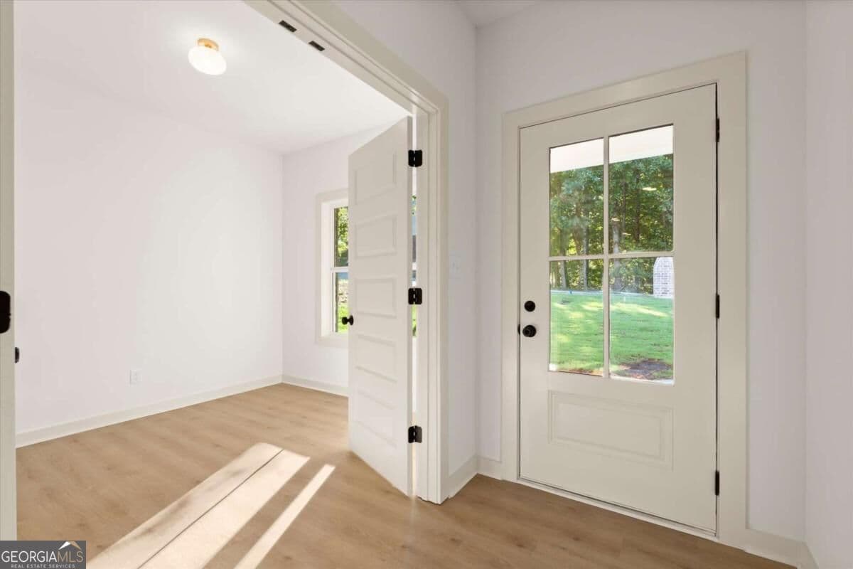 4 bedroom, 3 bathroom single family residence for sale at 4380 Huntcliff Trace, Douglasville, GA 30135 — photo 5