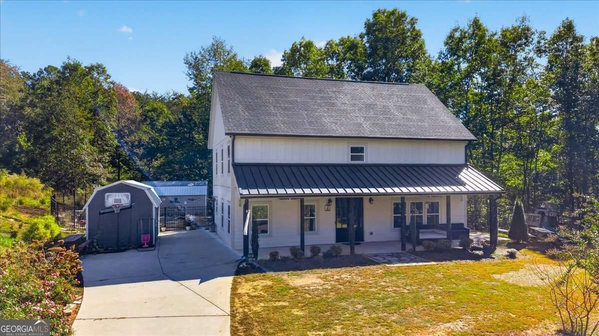 5 bedroom, 3 bathroom, 2,640 sq ft single family residence for sale at 914 Lower Bethany Road, Ball Ground, GA 30107 — photo 2