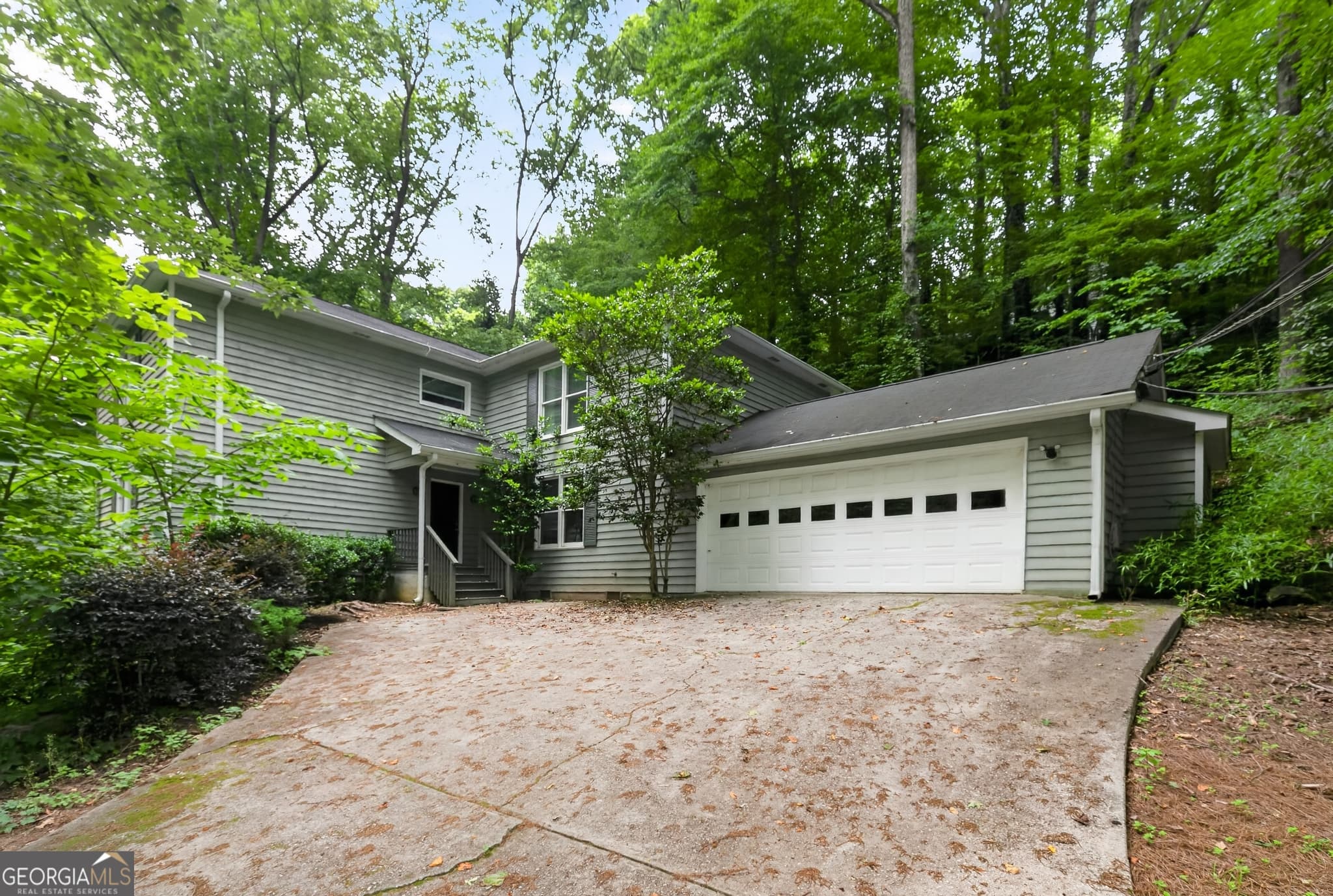 5 bedroom, 3 bathroom, 2,944 sq ft single family residence for sale at 7127 Riverside Drive, Atlanta, GA 30328 — photo 1 of 32