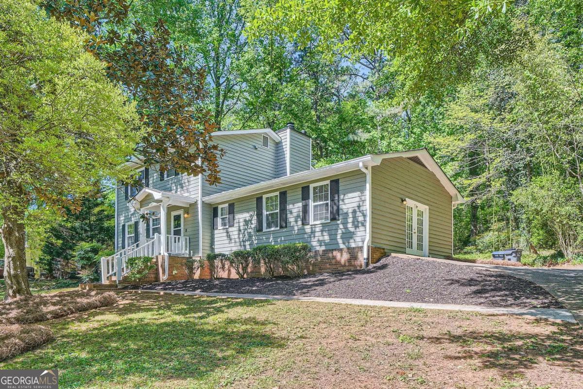 3 bedroom, 2.5 bathroom, 2,002 sq ft single family residence sold at 1718 Country Park Way, Lawrenceville, GA 30043