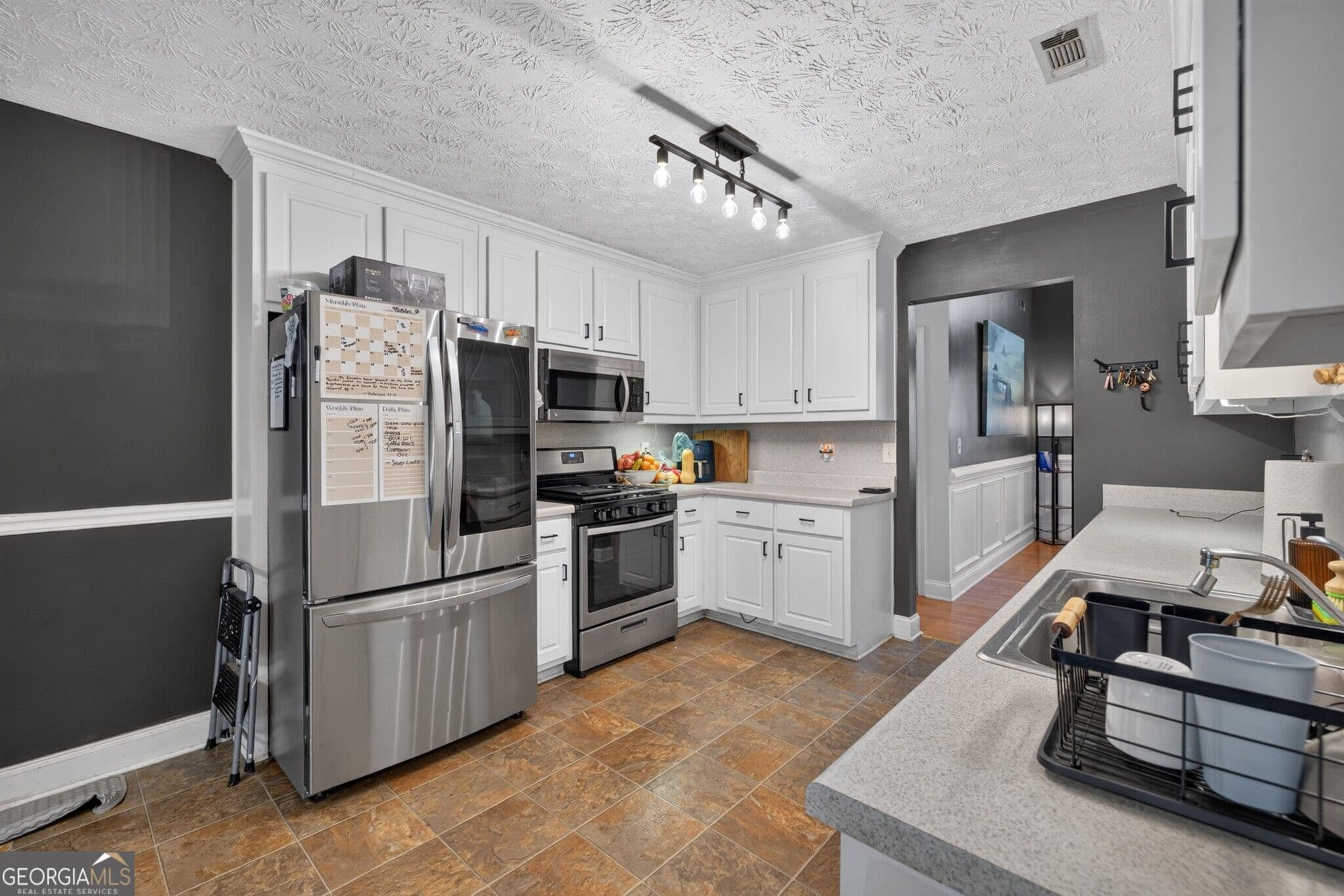 4 bedroom, 2 bathroom, 1,960 sq ft single family residence for sale at 25 Lake Charles Court, Covington, GA 30016 — photo 3