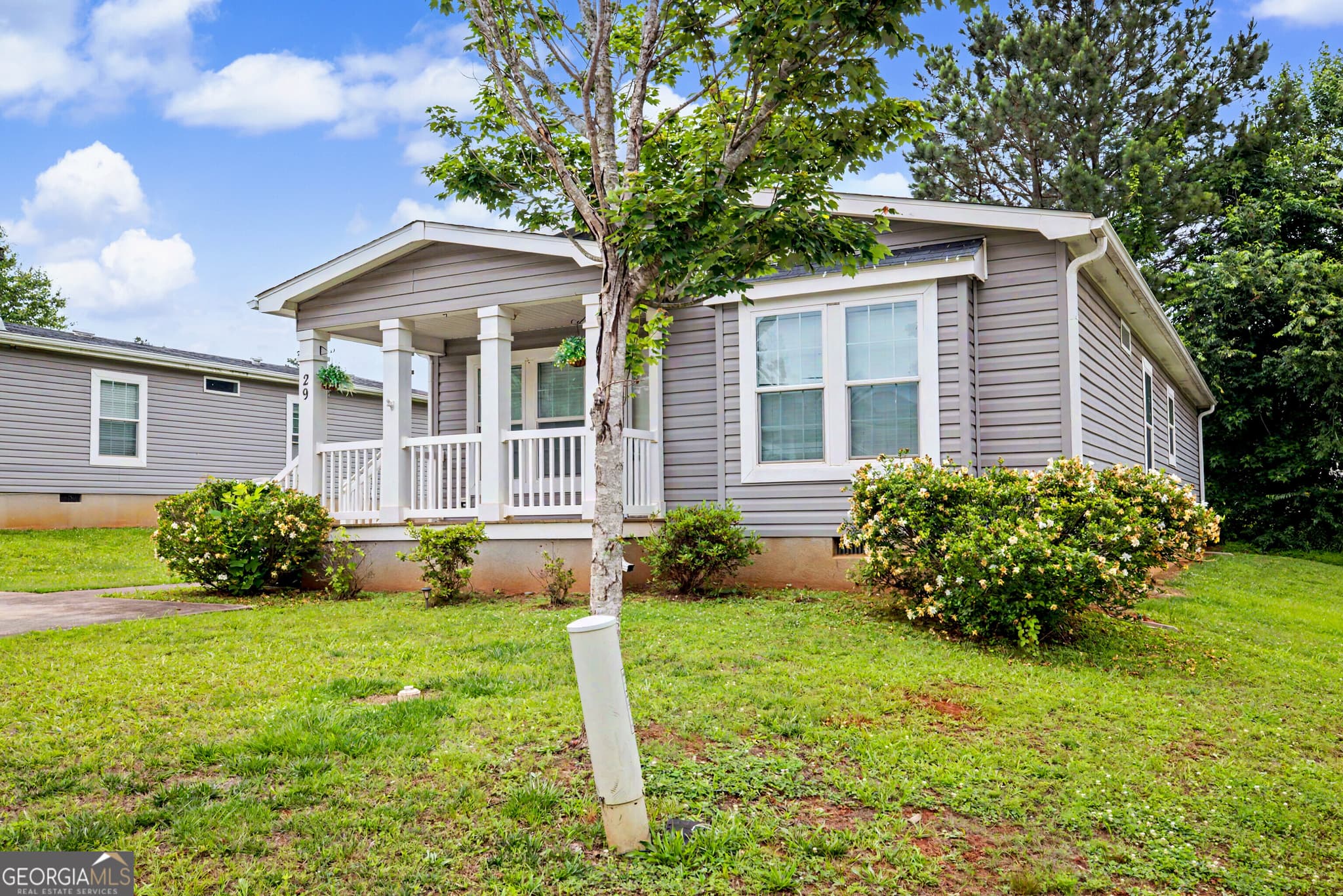 3 bedroom, 2 bathroom, 1,540 sq ft manufactured home,single family residence for sale at 29 Meadow View Street, Newnan, GA 30263 — photo 2