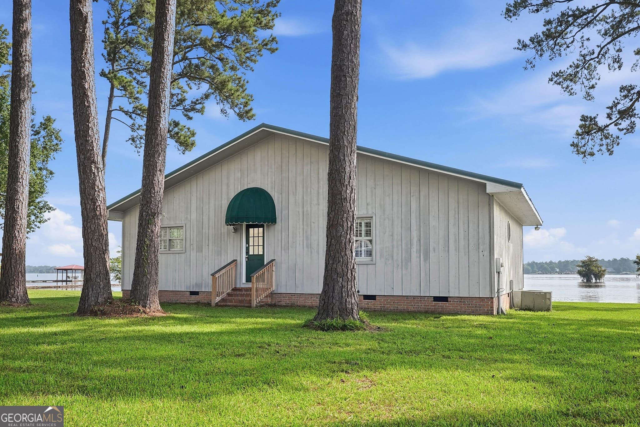 2 bedroom, 2 bathroom, 1,347 sq ft cabin,single family residence for sale at 106 Cantey Drive, Cobb, GA 31735 — photo 2