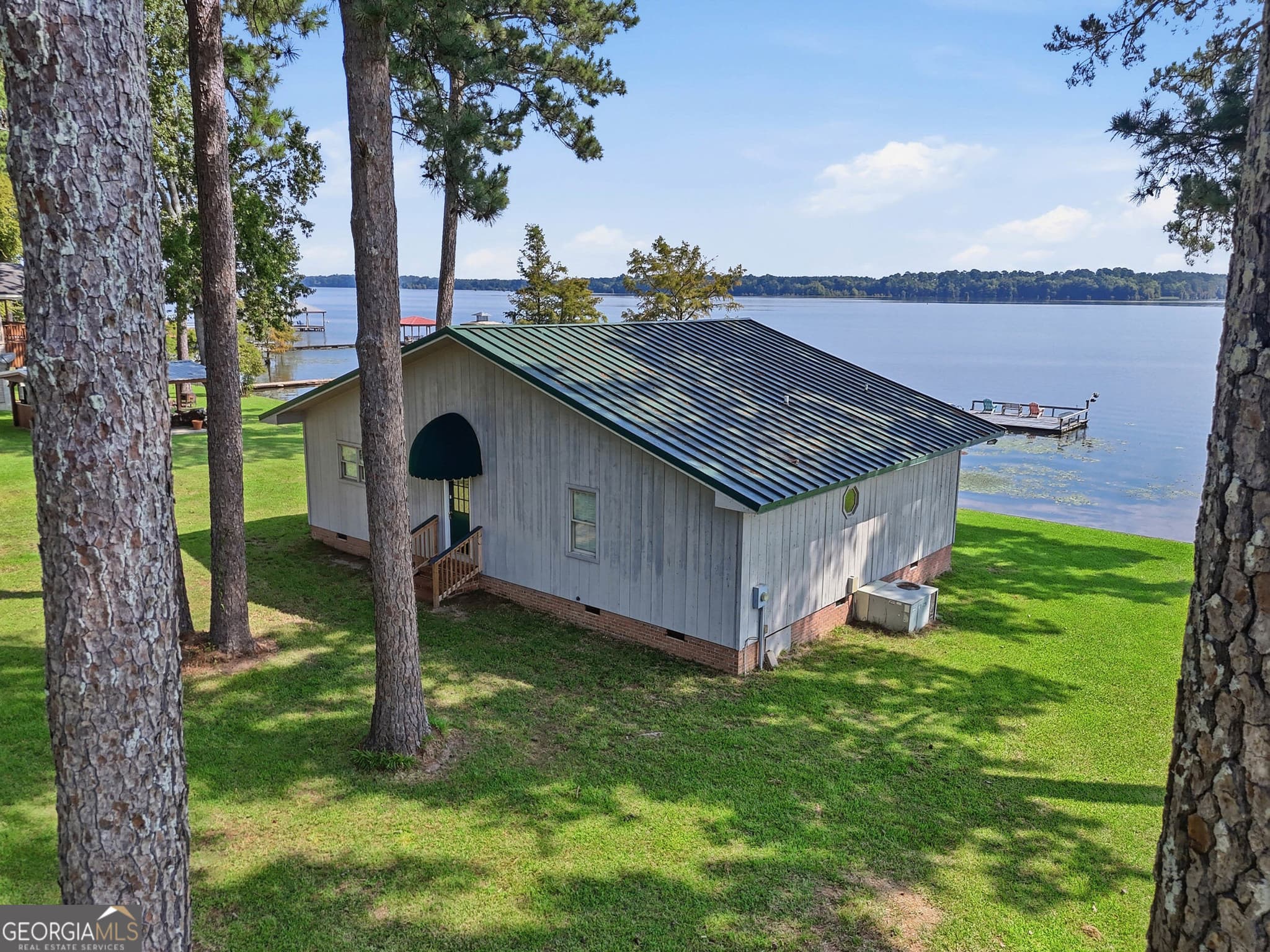 2 bedroom, 2 bathroom, 1,347 sq ft cabin,single family residence for sale at 106 Cantey Drive, Cobb, GA 31735 — photo 4
