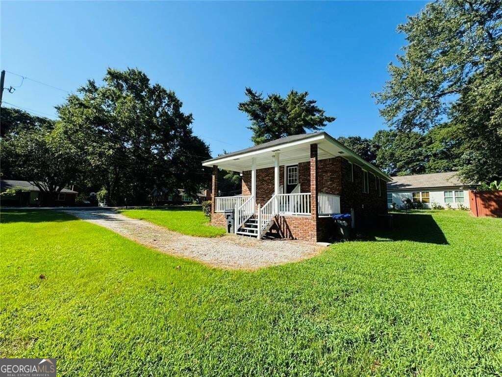 2 bedroom, 1 bathroom, 951 sq ft single family residence for sale at 246 Bruce Street, Loganville, GA 30052 — photo 2