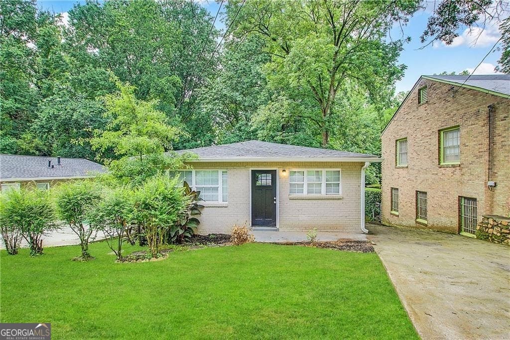 4 bedroom, 2 bathroom, 975 sq ft single family residence for sale at 491 Elbridge Drive, Atlanta, GA 30318 — photo 1 of 11