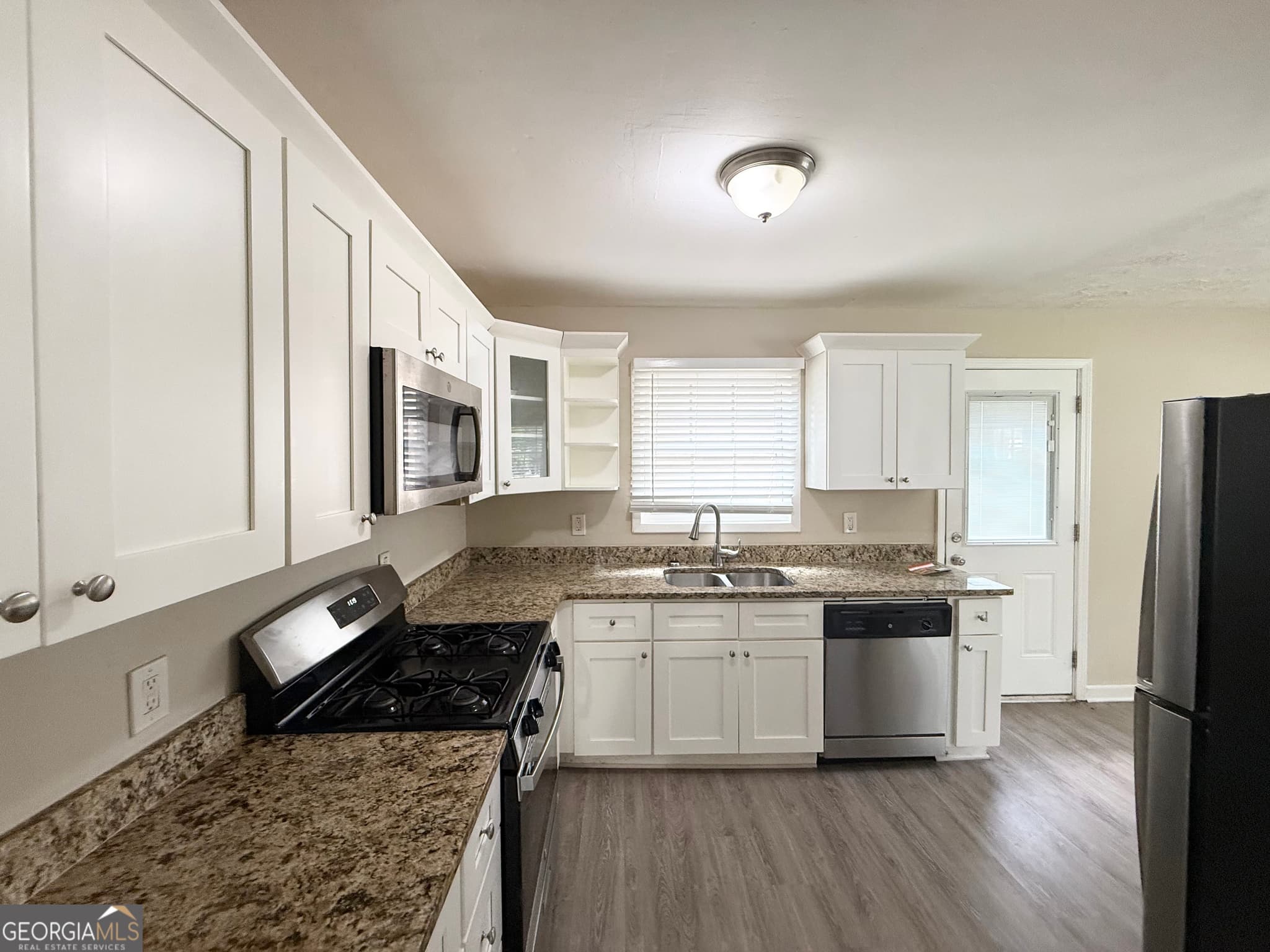 4 bedroom, 2 bathroom, 975 sq ft single family residence for sale at 491 Elbridge Drive, Atlanta, GA 30318 — photo 4