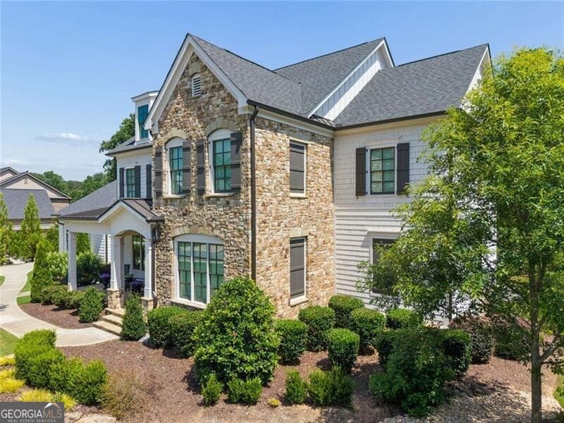 6 bedroom, 5 bathroom, 6,319 sq ft single family residence for sale at 1060 Kent Court, Milton, GA 30004 — photo 2