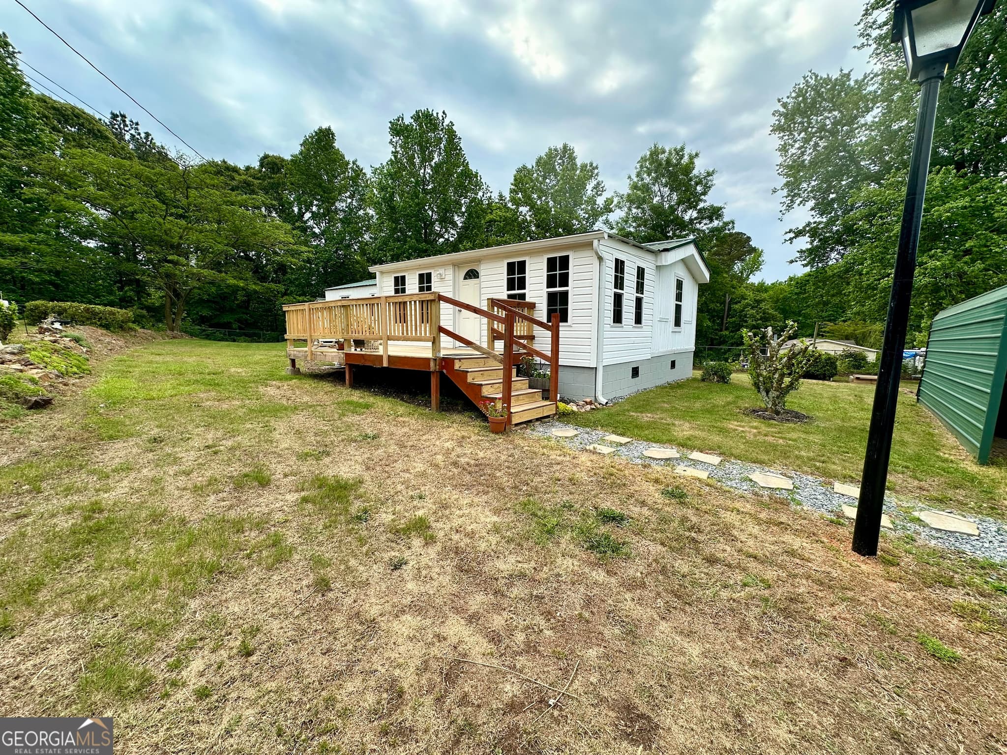 2 bedroom, 1 bathroom, 900 sq ft manufactured home,single family residence for sale at 7315 Wits End Drive, Gainesville, GA 30506 — photo 1 of 26