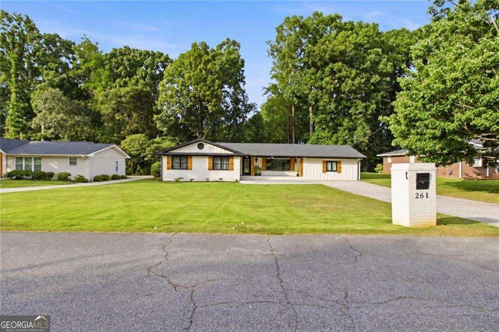 4 bedroom, 3 bathroom, 2,027 sq ft single family residence for sale at 261 Lendon Lane, Lawrenceville, GA 30043 — photo 2