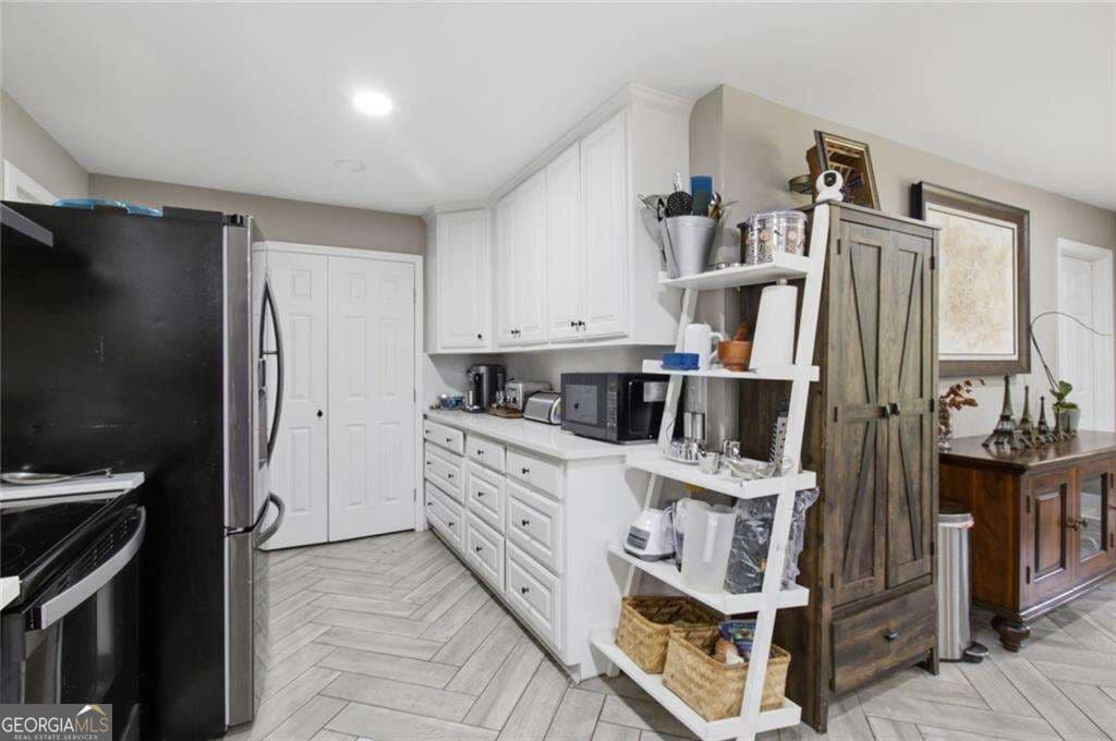 4 bedroom, 3 bathroom, 2,027 sq ft single family residence for sale at 261 Lendon Lane, Lawrenceville, GA 30043 — photo 10