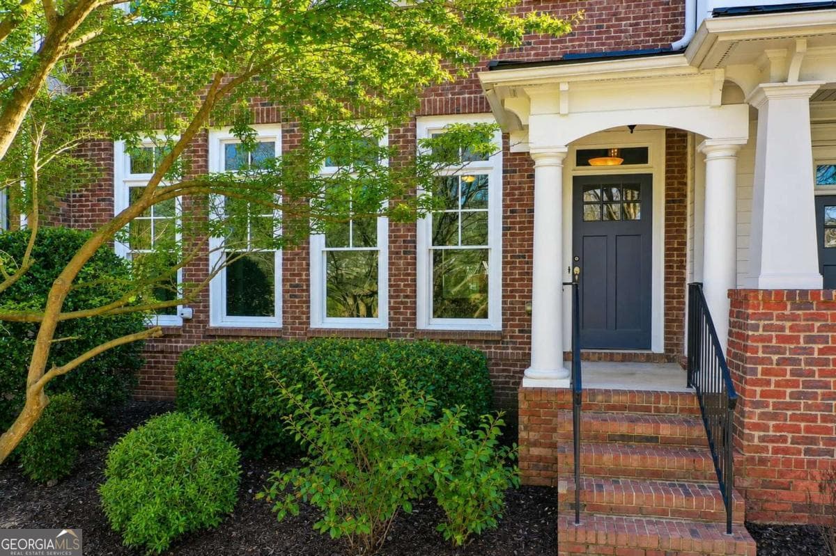 4 bedroom, 2.5 bathroom, 3,049 sq ft townhouse for sale at 12541 Danesfeld Drive, Milton, GA 30004 — photo 2