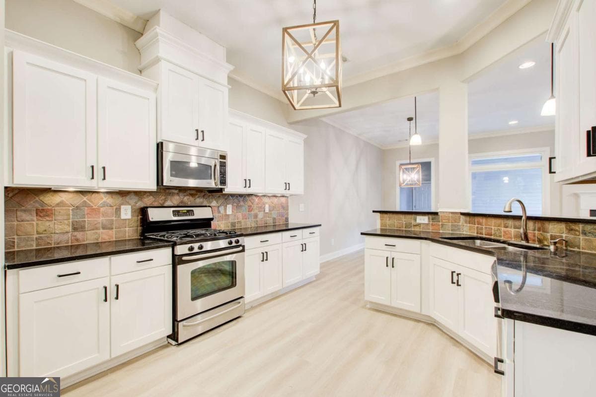 4 bedroom, 2.5 bathroom, 3,049 sq ft townhouse for sale at 12541 Danesfeld Drive, Milton, GA 30004 — photo 10