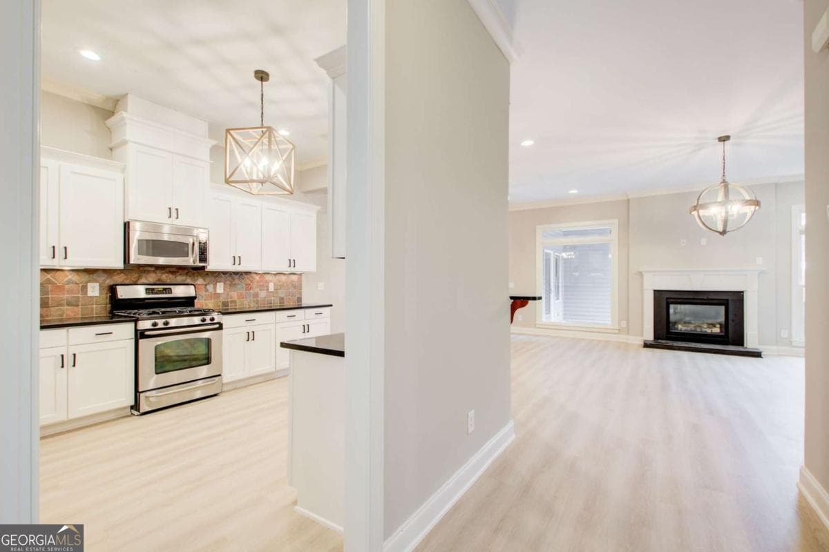 4 bedroom, 2.5 bathroom, 3,049 sq ft townhouse for sale at 12541 Danesfeld Drive, Milton, GA 30004 — photo 8