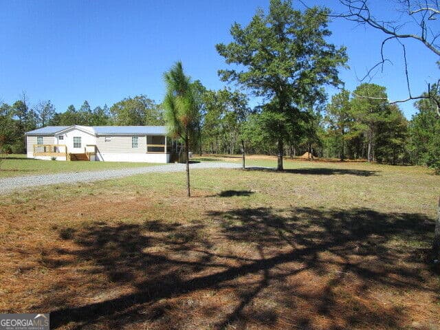 3 bedroom, 2 bathroom, 1,344 sq ft manufactured home,single family residence for sale at 146 Oakland Way, Box Springs, GA 31801 — photo 2