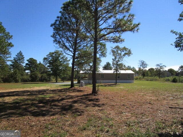 3 bedroom, 2 bathroom, 1,344 sq ft manufactured home,single family residence for sale at 146 Oakland Way, Box Springs, GA 31801 — photo 7