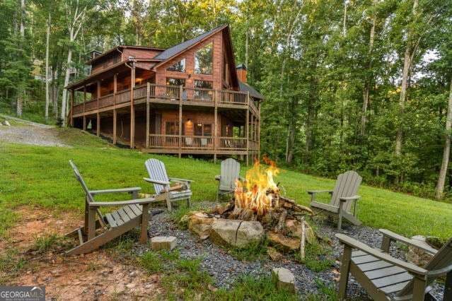 4 bedroom, 3.5 bathroom, 3,594 sq ft cabin,single family residence for sale at 34 Highland Forest Trail, Morganton, GA 30560 — photo 2