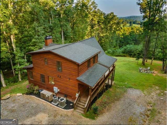 4 bedroom, 3.5 bathroom, 3,594 sq ft cabin,single family residence for sale at 34 Highland Forest Trail, Morganton, GA 30560 — photo 6