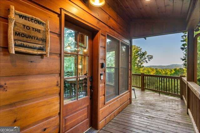 4 bedroom, 3.5 bathroom, 3,594 sq ft cabin,single family residence for sale at 34 Highland Forest Trail, Morganton, GA 30560 — photo 3