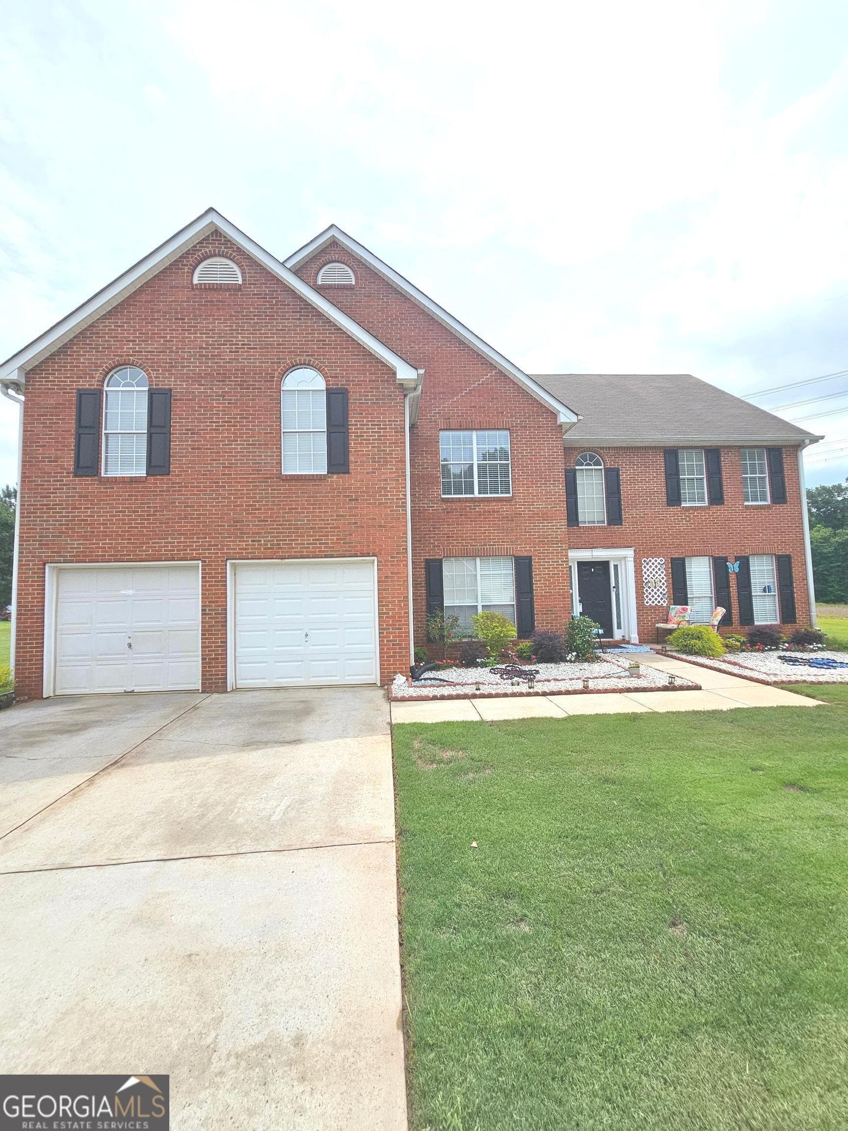 5 bedroom, 3 bathroom, 3,245 sq ft single family residence for sale at 151 Olympic Drive, Fayetteville, GA 30215 — photo 2