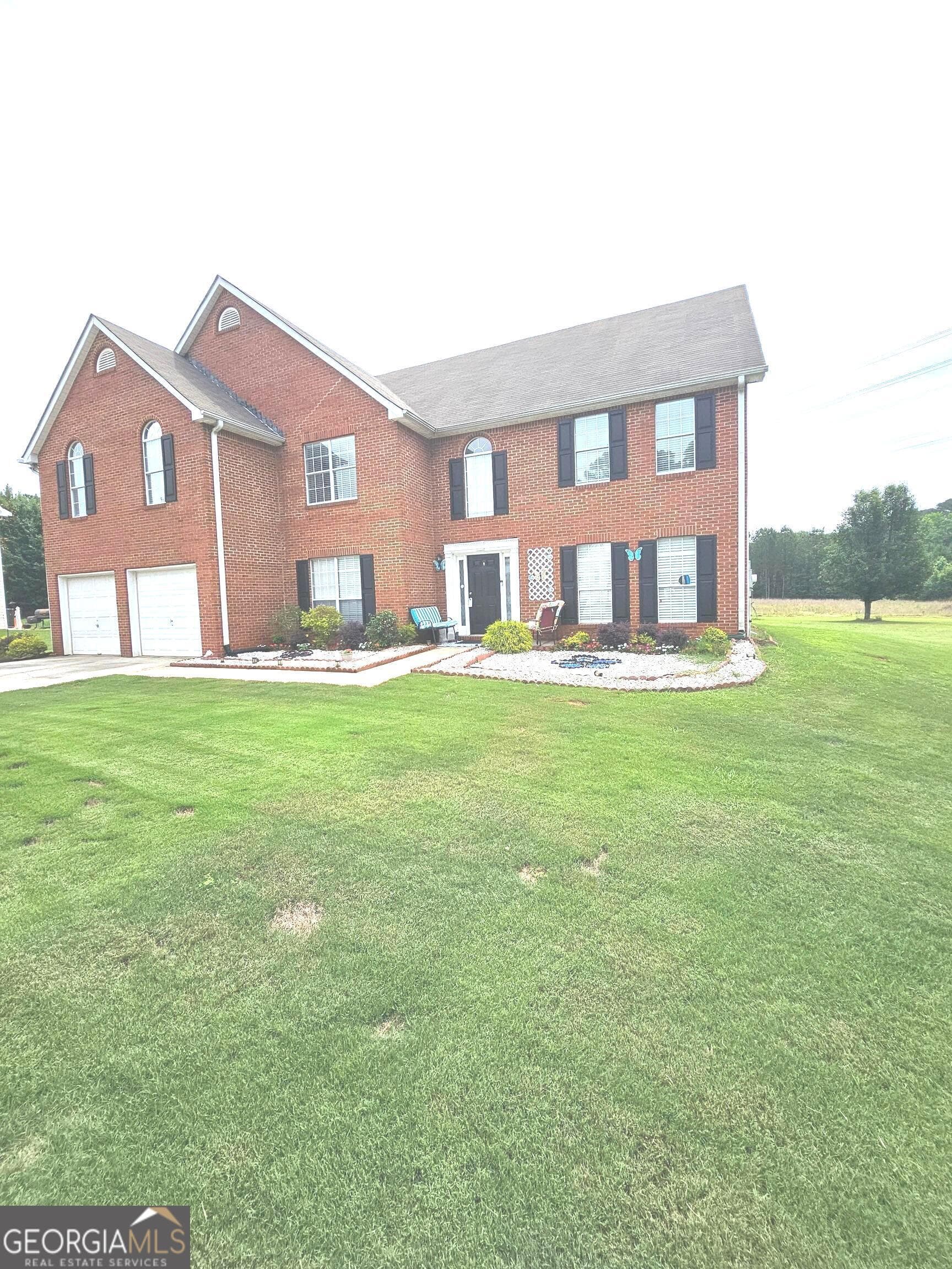 5 bedroom, 3 bathroom, 3,245 sq ft single family residence for sale at 151 Olympic Drive, Fayetteville, GA 30215 — photo 3