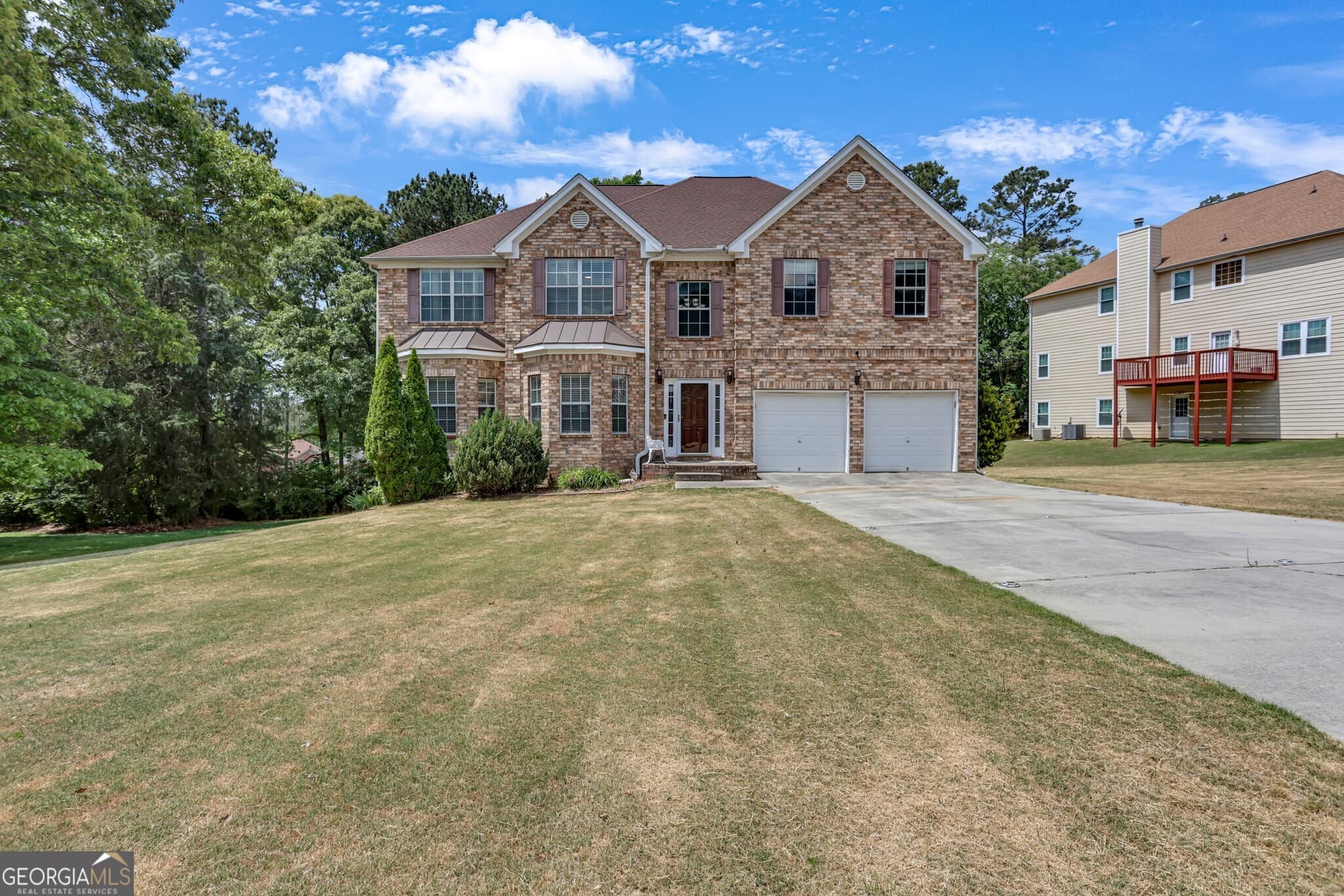 6 bedroom, 4.5 bathroom, 5,775 sq ft single family residence for sale at 605 Harris Court, Conyers, GA 30012
