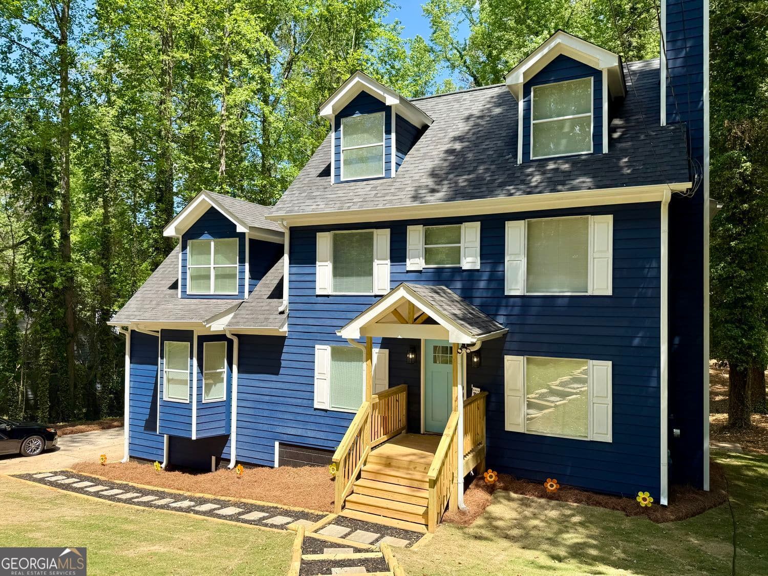 4 bedroom, 3.5 bathroom, 2,359 sq ft single family residence for sale at 4232 Marjorie Road, Snellville, GA 30039 — photo 1 of 52