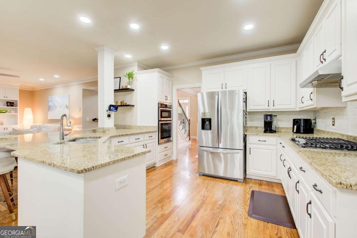 5 bedroom, 3.5 bathroom, 5,699 sq ft single family residence for sale at 2452 Twilight View, Snellville, GA 30078 — photo 6