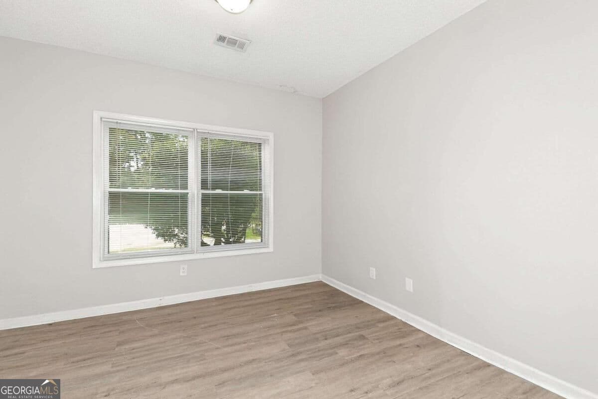 4 bedroom, 3 bathroom single family residence for rent at 5730 Broadleaf Way, Atlanta, GA 30349 for $2,120 a month — photo 6